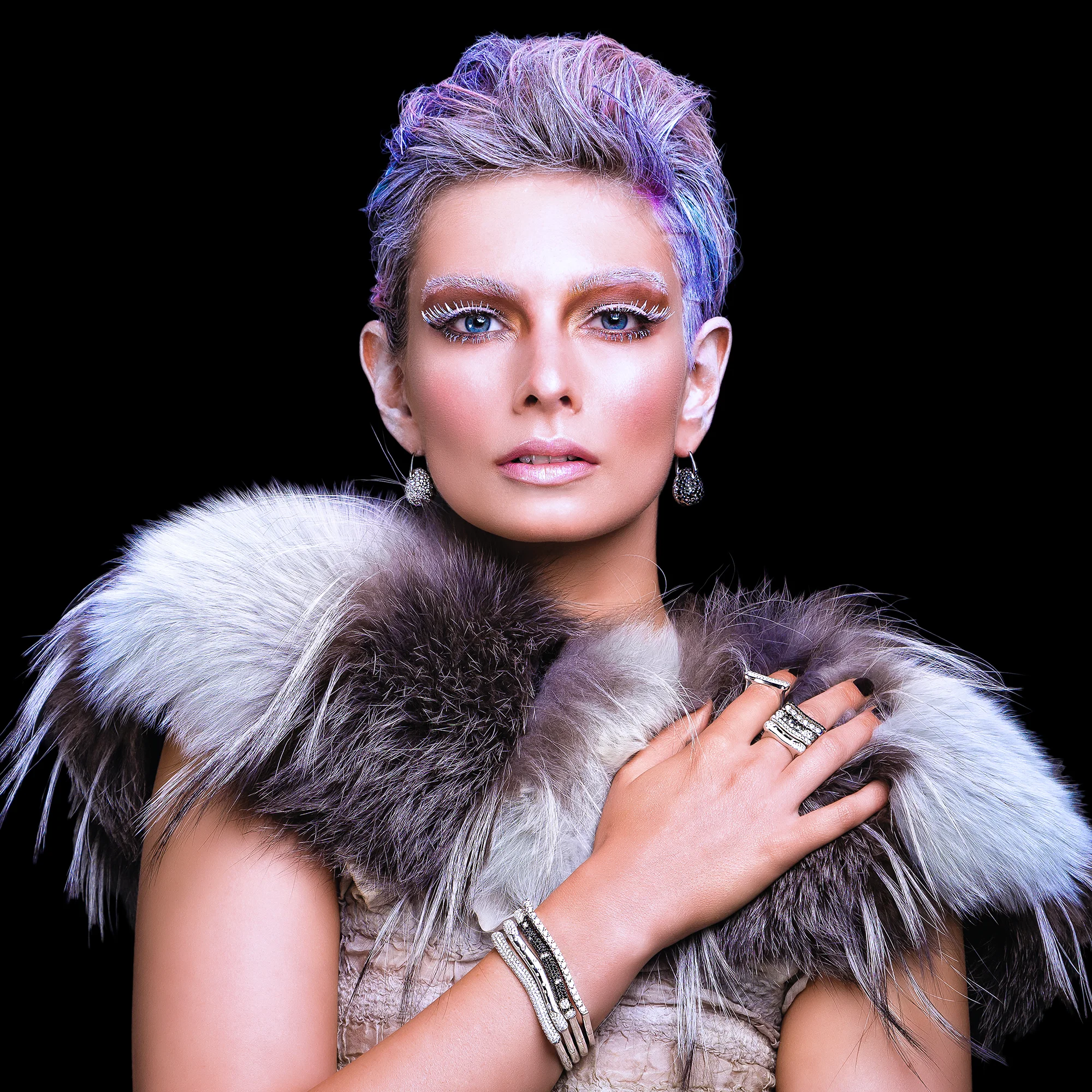 FRIDA | Fine Jewellery. Strata™ Collection. Emma Lamb modeling diamond stacking bracelets and rings in 18kt white gold.