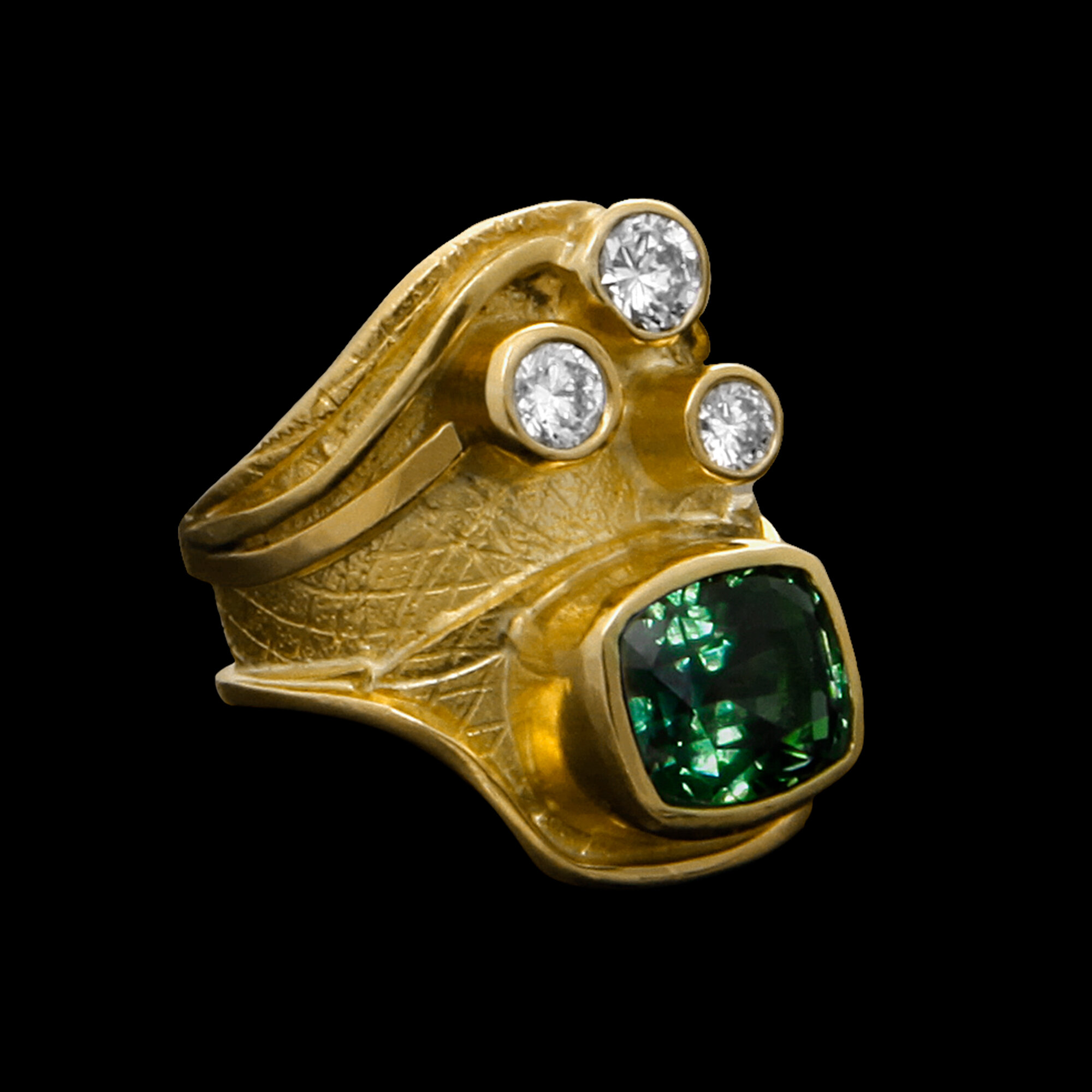 FRIDA | Fine Jewellery. Shield™ Collection, Xio ring. Custom designed ring in 18kt yellow gold set with a faceted green sapphire and diamonds. View1.jpg