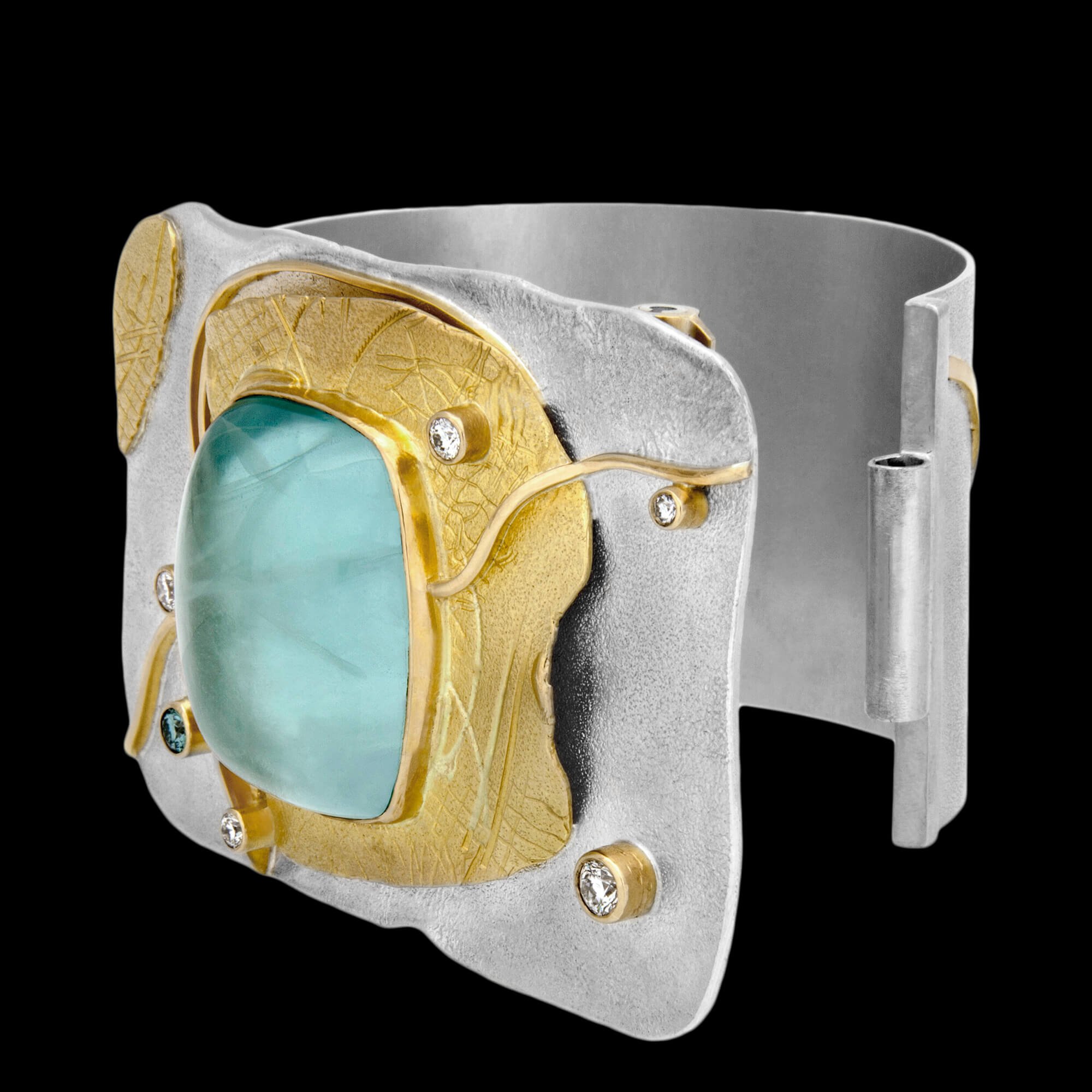 Custom sterling silver and 18kt yellow gold Shackle cuff with a cabochon-cut aquamarine and diamonds. Shackle cuff. Open | Shield Collection. FRIDA  Fine Jewellery.jpg