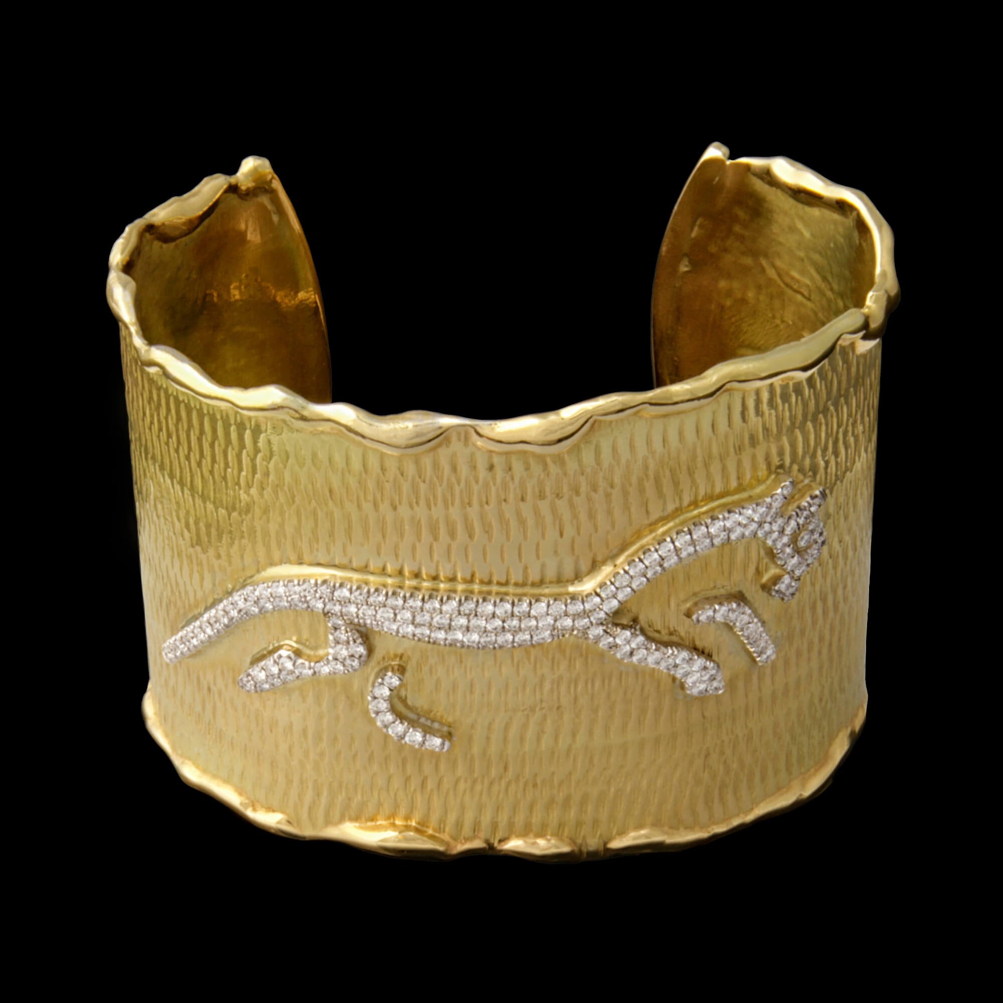 Custom 18kt yellow gold cuff with pavé-set diamonds. White horse spirit cuff - Caribou Collection. FRIDA | Fine Jewellery.jpg