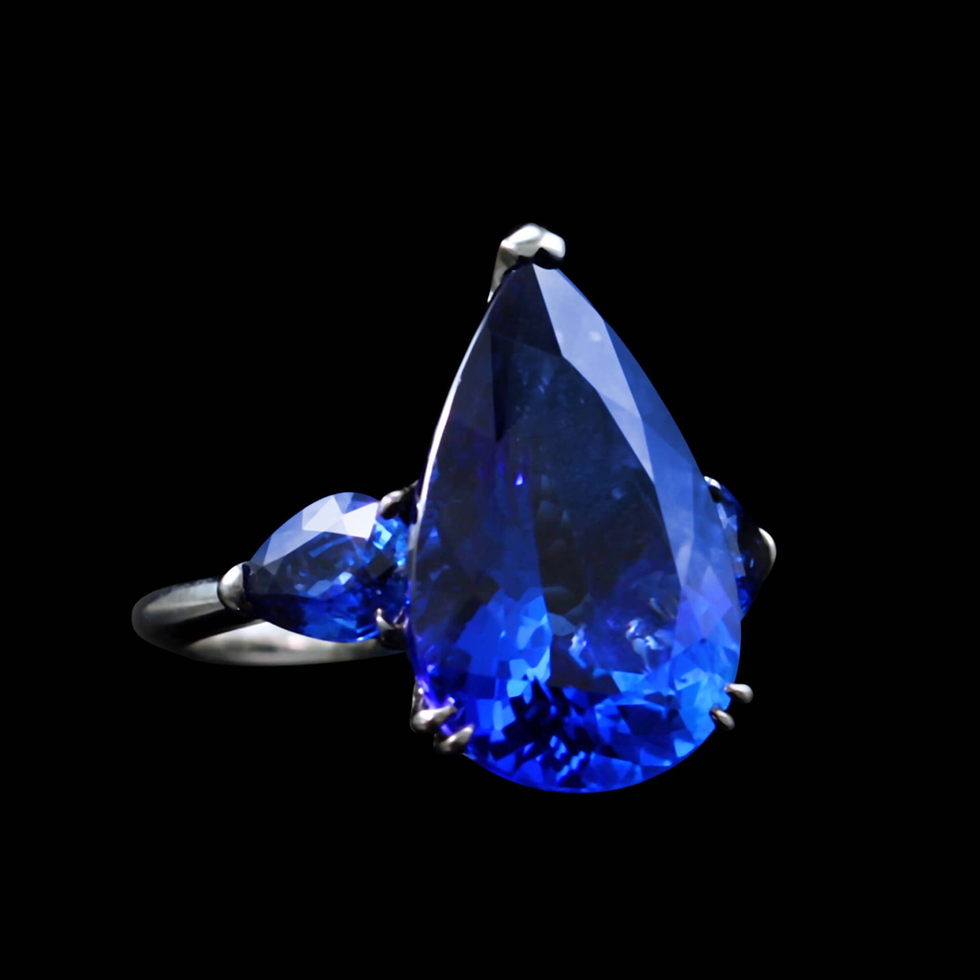 One-of-a-kind pear-shaped tanzanite and blue sapphire ring set in 18kt black gold. Side. FRIDA | Fine Jewellery.jpg