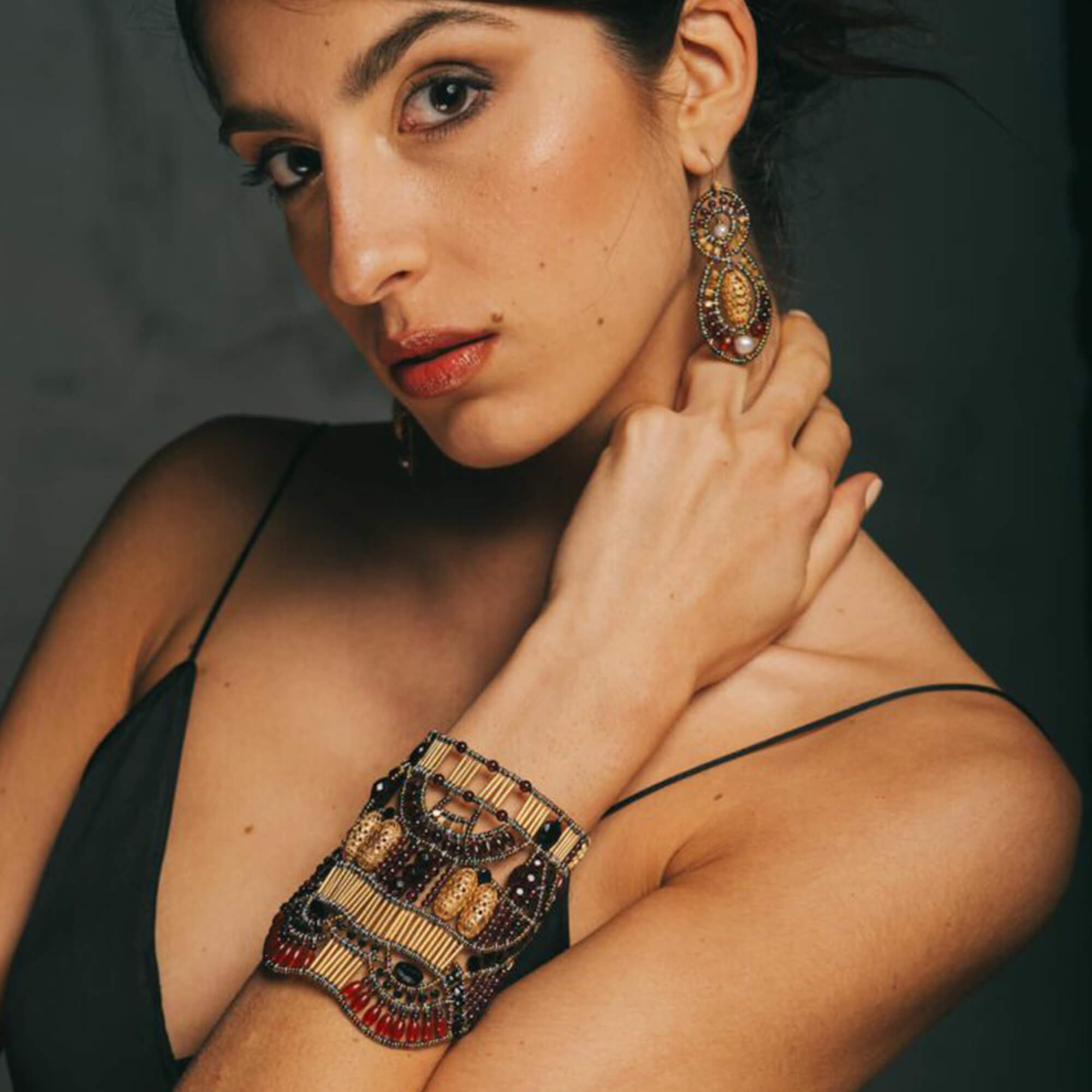 Doree bracelet with carnelian, garnet, tourmaline, onyx, spinel, Murano glass beads and silver. Model. Featured Brand | ZIIO. FRIDA | Fine Jewellery.jpg