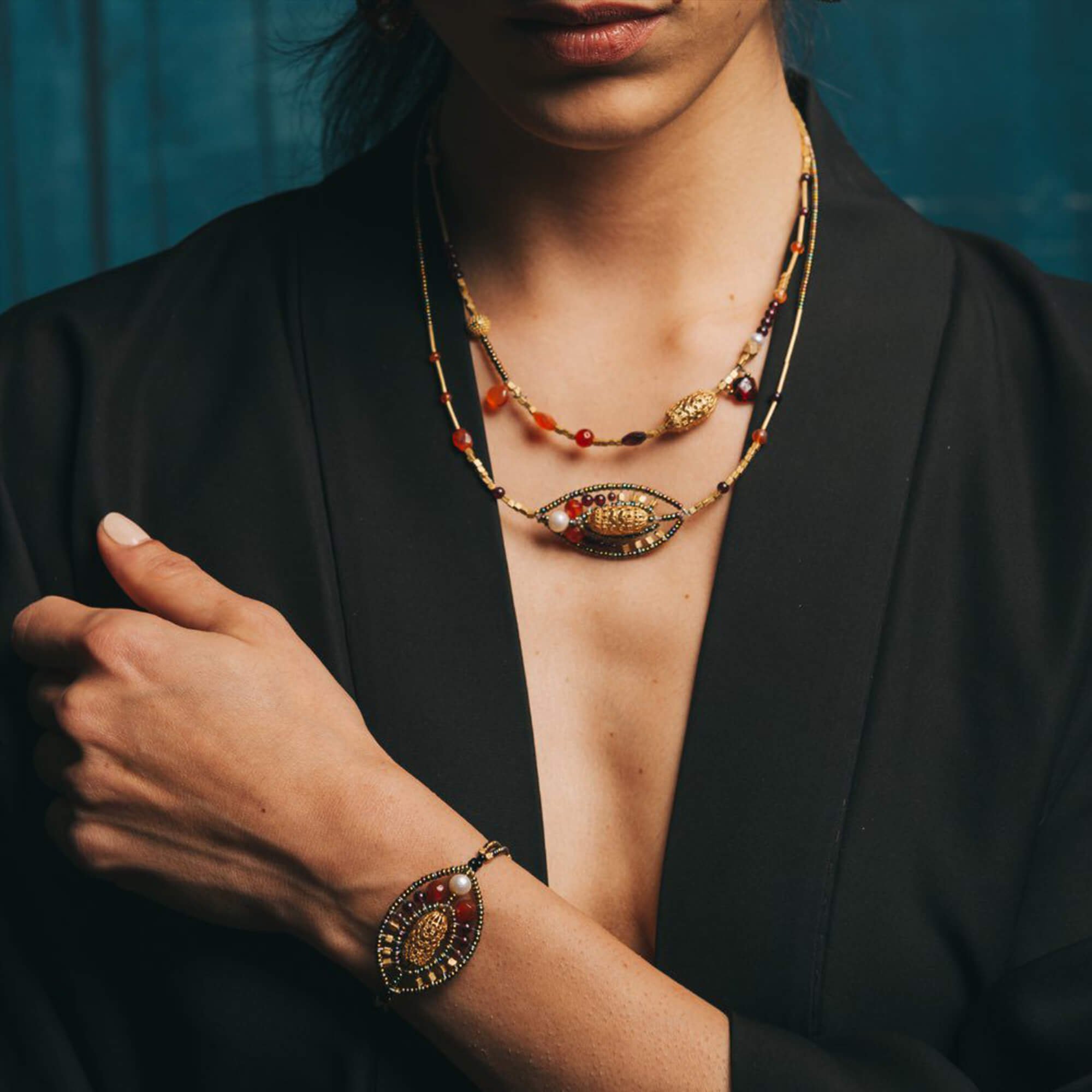 Orange Raja necklace with carnelian, garnet, gold-plated brass, Murano glass beads and sterling silver. Model. Featured Brand | ZIIO. FRIDA | Fine Jewellery.jpg