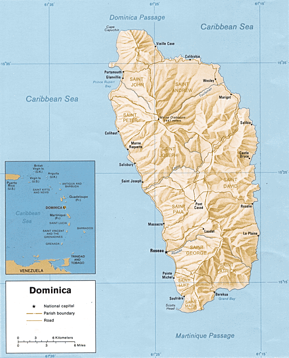 Map of Dominica showing its parish boundaries, roads, and key locations, with surrounding Caribbean Sea and inset map of Caribbean islands.