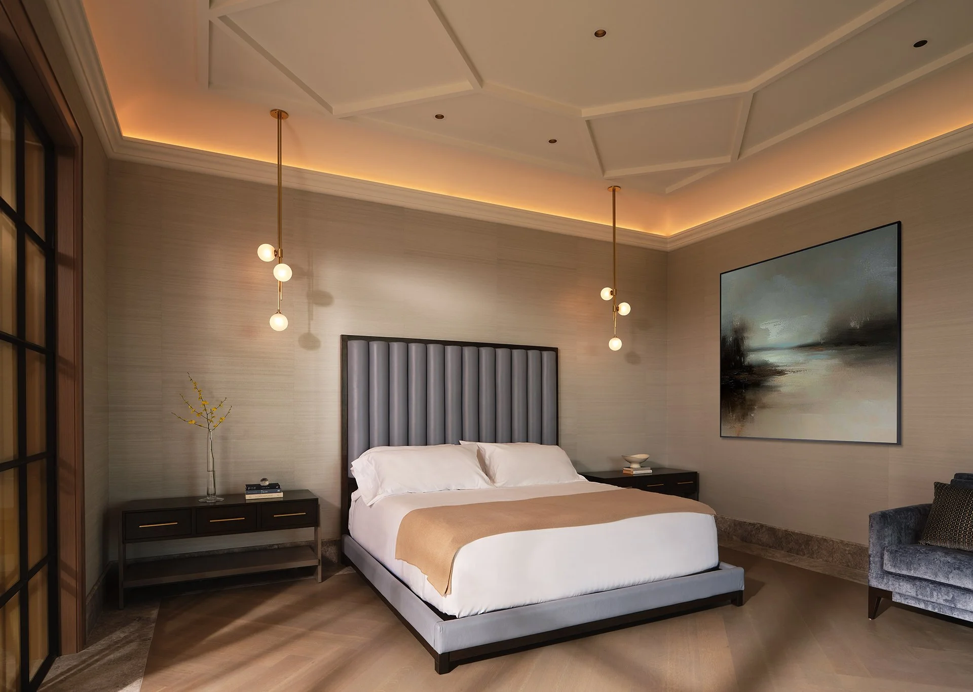 Napa master bedroom by Wolk Design with a fluted blue headboard, orb pendant lights, and geometric ceiling.