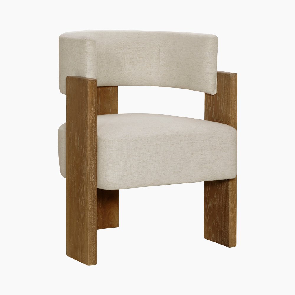 Carter Dining Chair featuring a sculptural three-leg solid oak base and curved barrel backrest in neutral performance fabric.