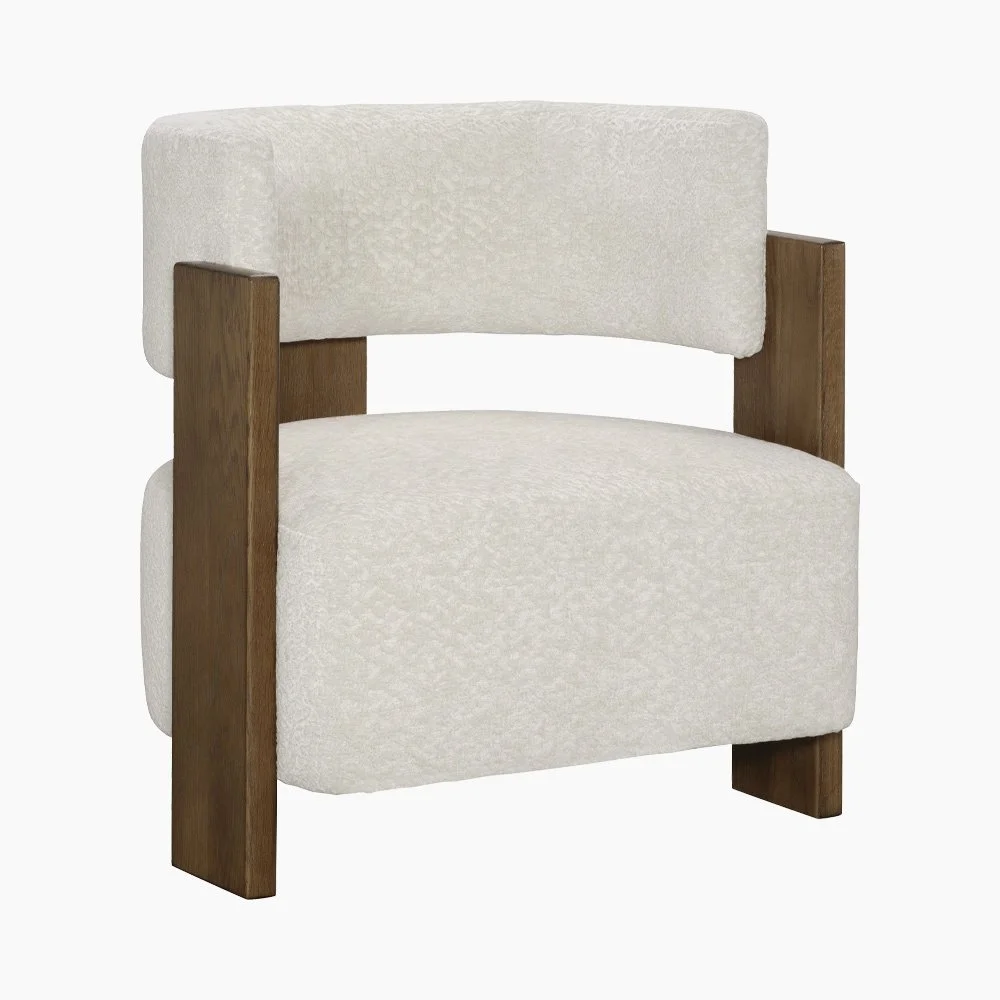 Carter Lounge Chair by Michael Wolk, featuring a 3-leg sculptural solid wood frame and upholstered barrel back