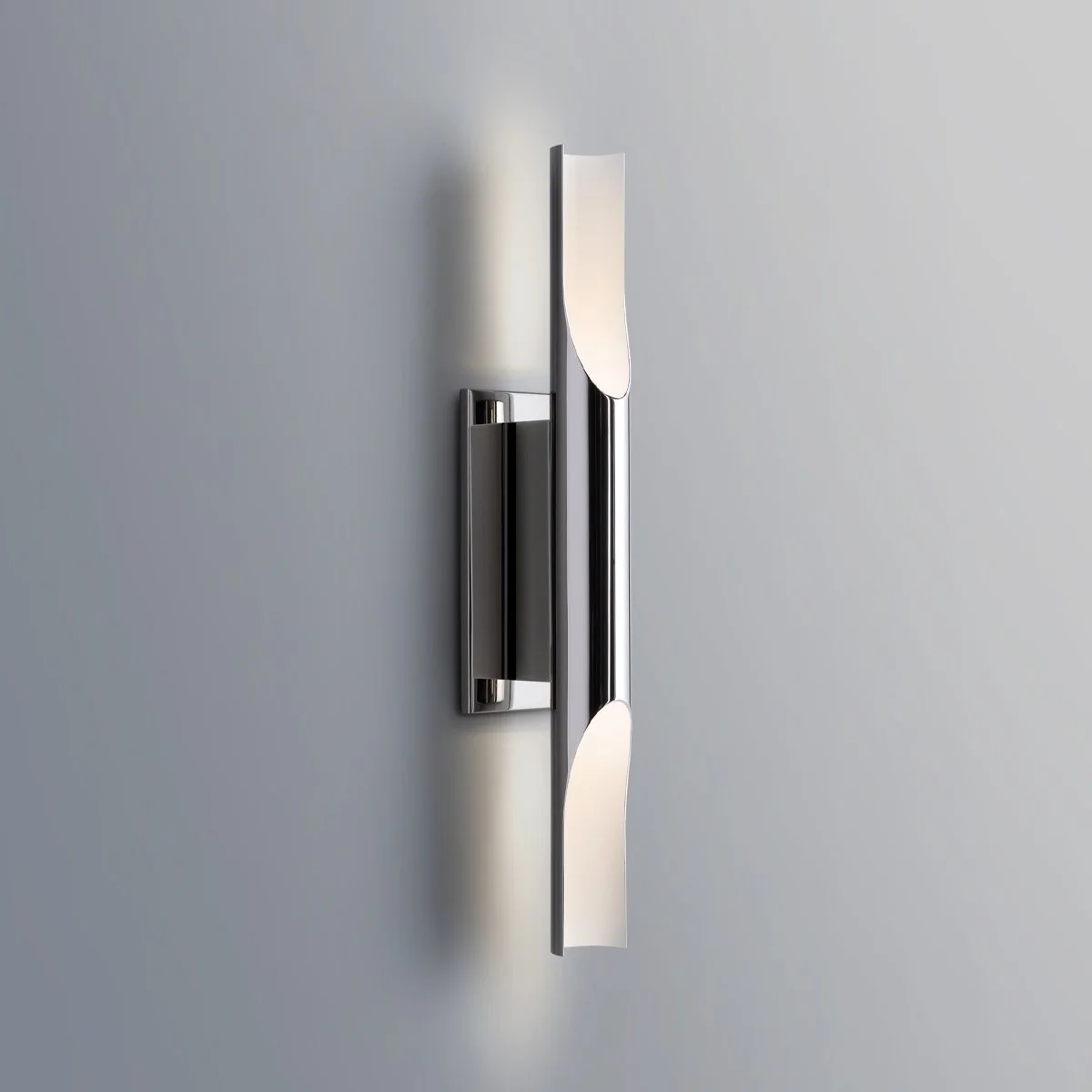 ADA-compliant Halfpipe LED wall sconce, designed by Michael Wolk, provides up and down light and won a Best of NeoCon Award, offered in six finish combinations.