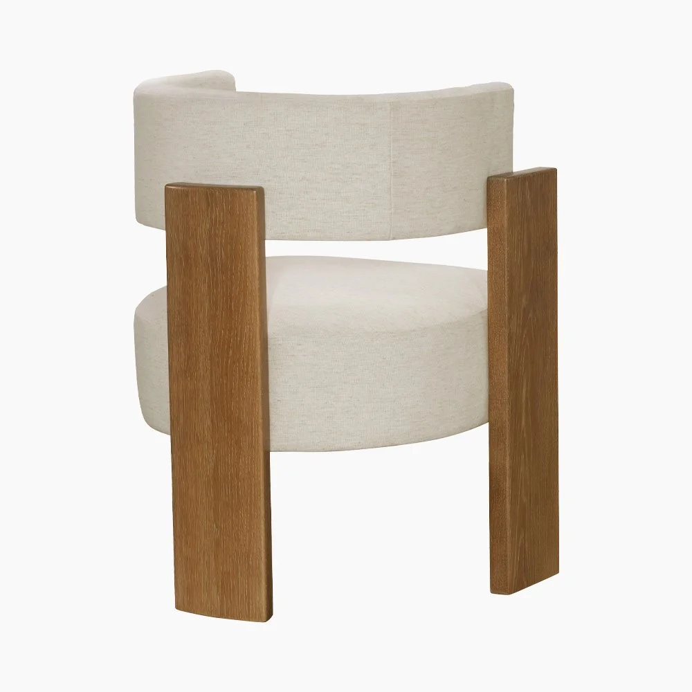 Modern organic Carter dining chair in a medium oak finish. Designed by Michael Wolk