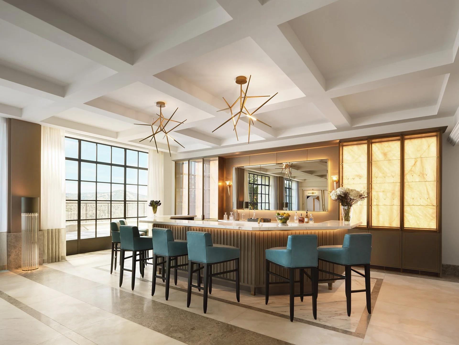 Home bar with coffered ceiling, modern starburst light fixtures, curved bar, teal barstools, and panoramic windows.
