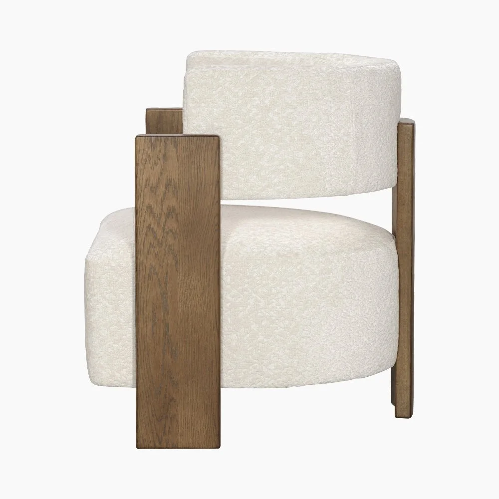 Side view of the Carter Lounge Chair in a neutral upholstery and walnut wood legs.