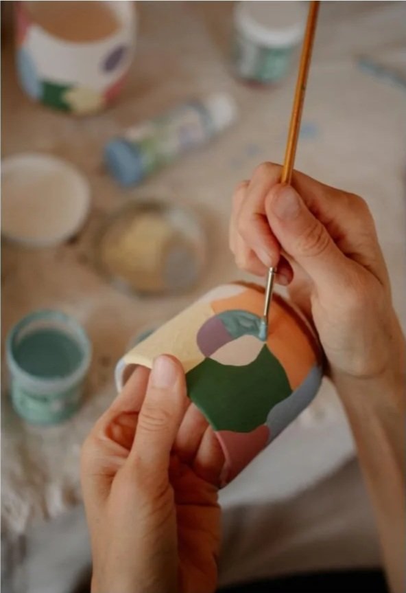 Painting a bisque ceramic cup