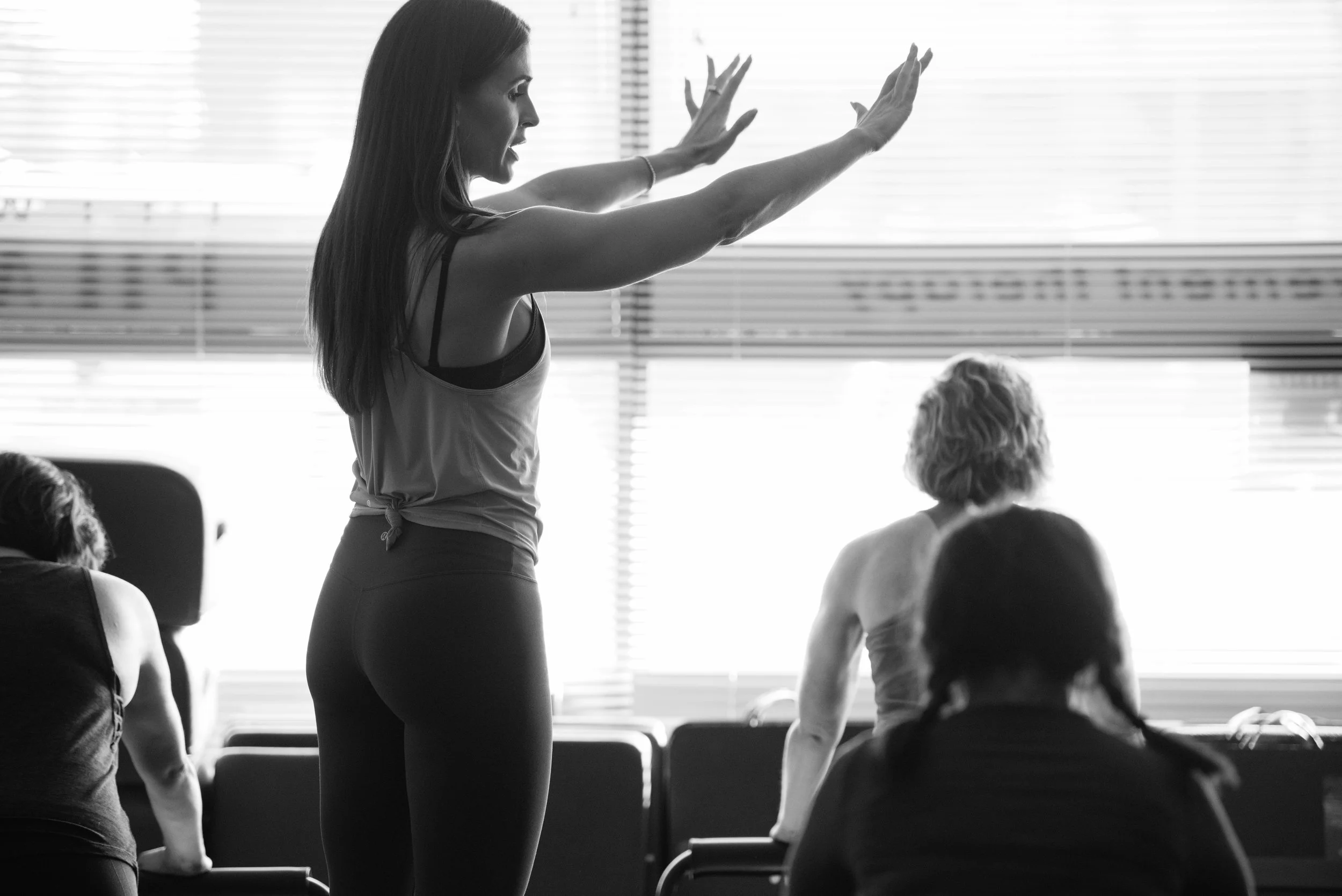 Pilates instructor teaching