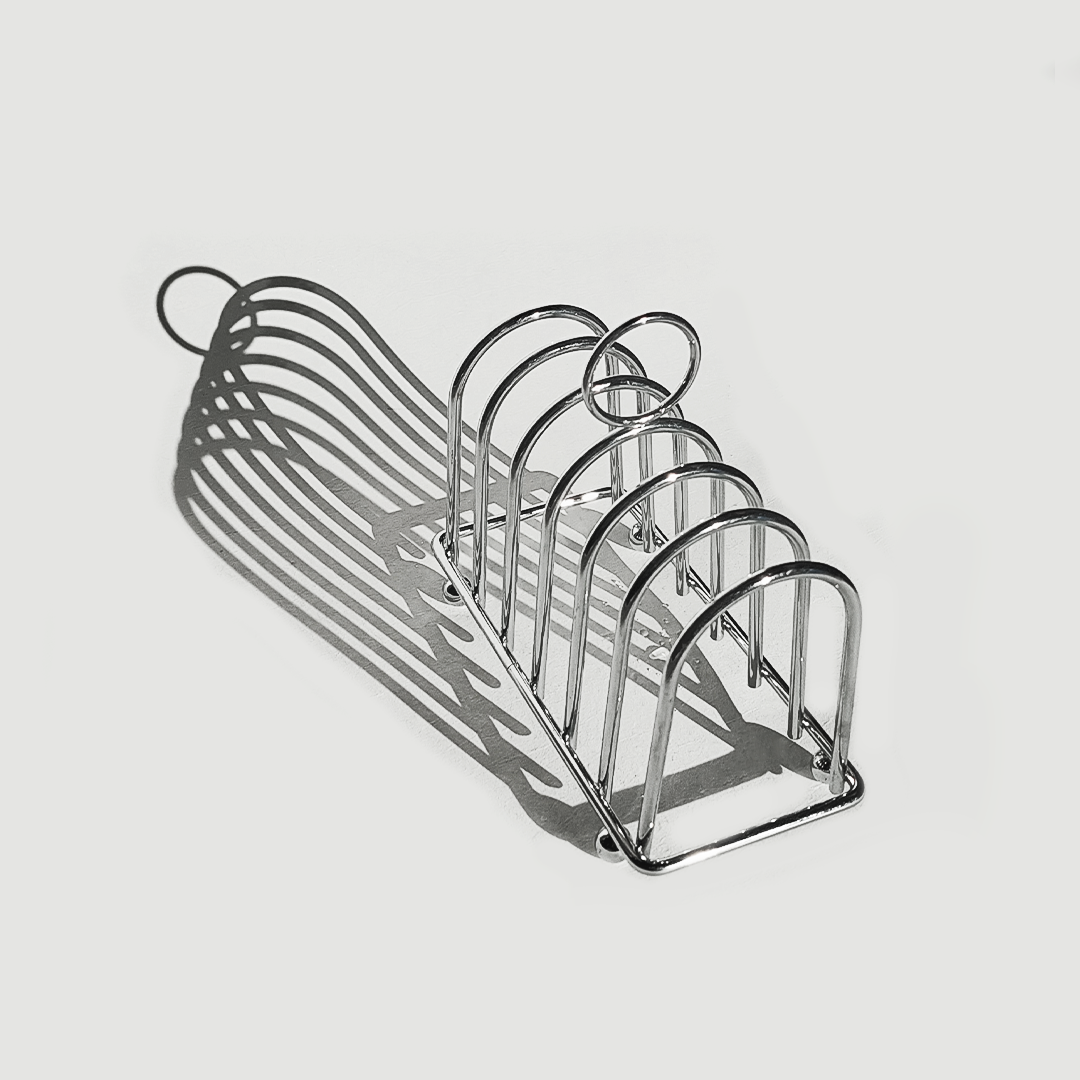 porte-toast-art-deco-argent-objoie-studioce-oceane-buret-2.webp