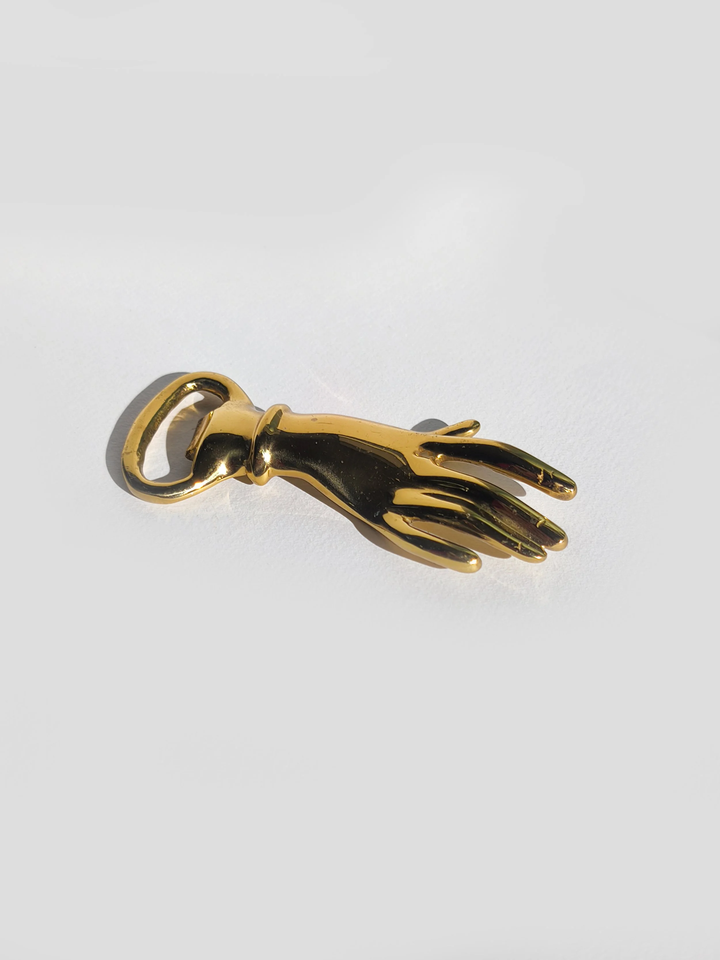 les-objoies-hand-golden-bottle-opener-1.jpg