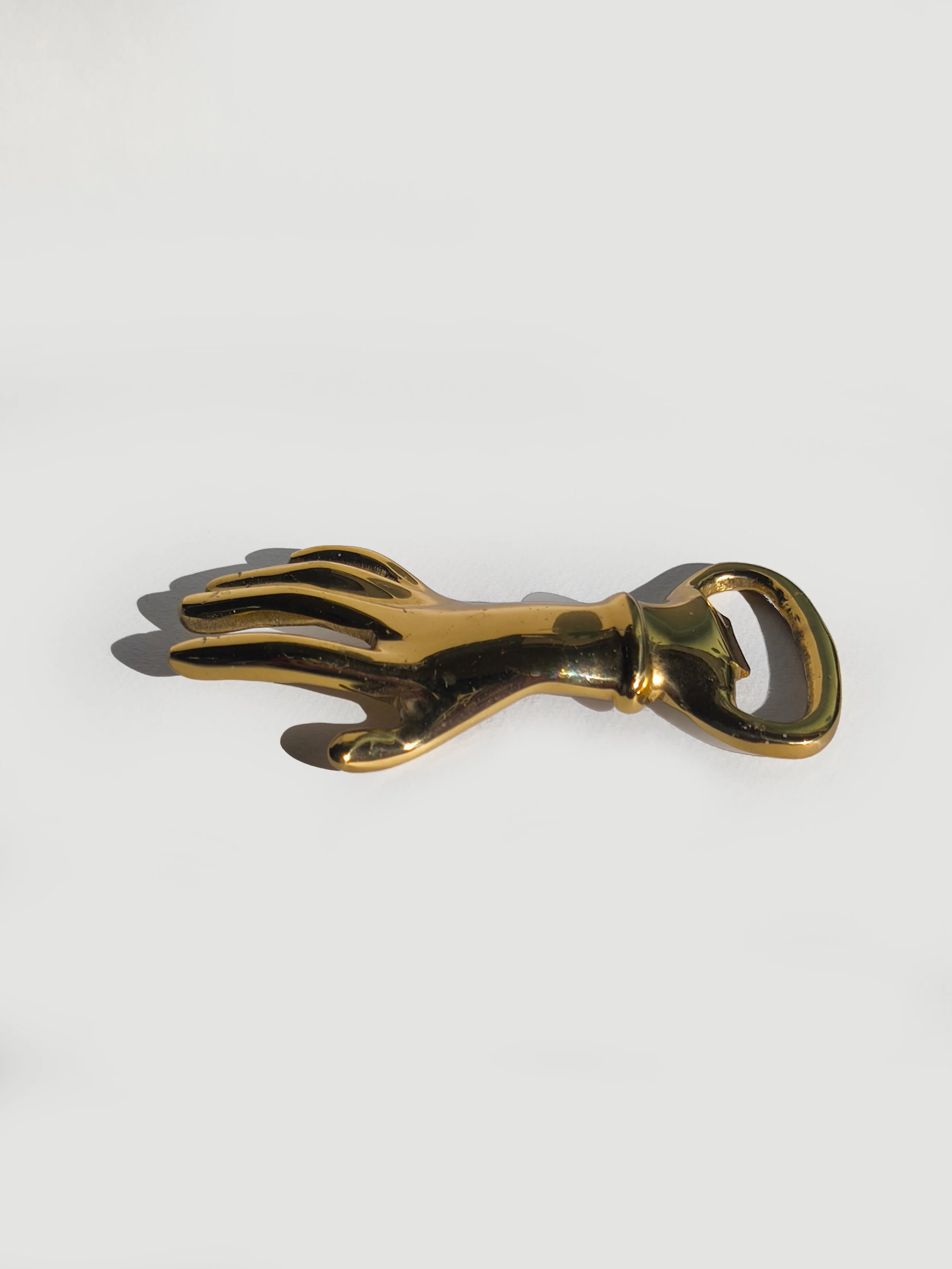 les-objoies-hand-golden-bottle-opener-3.jpg