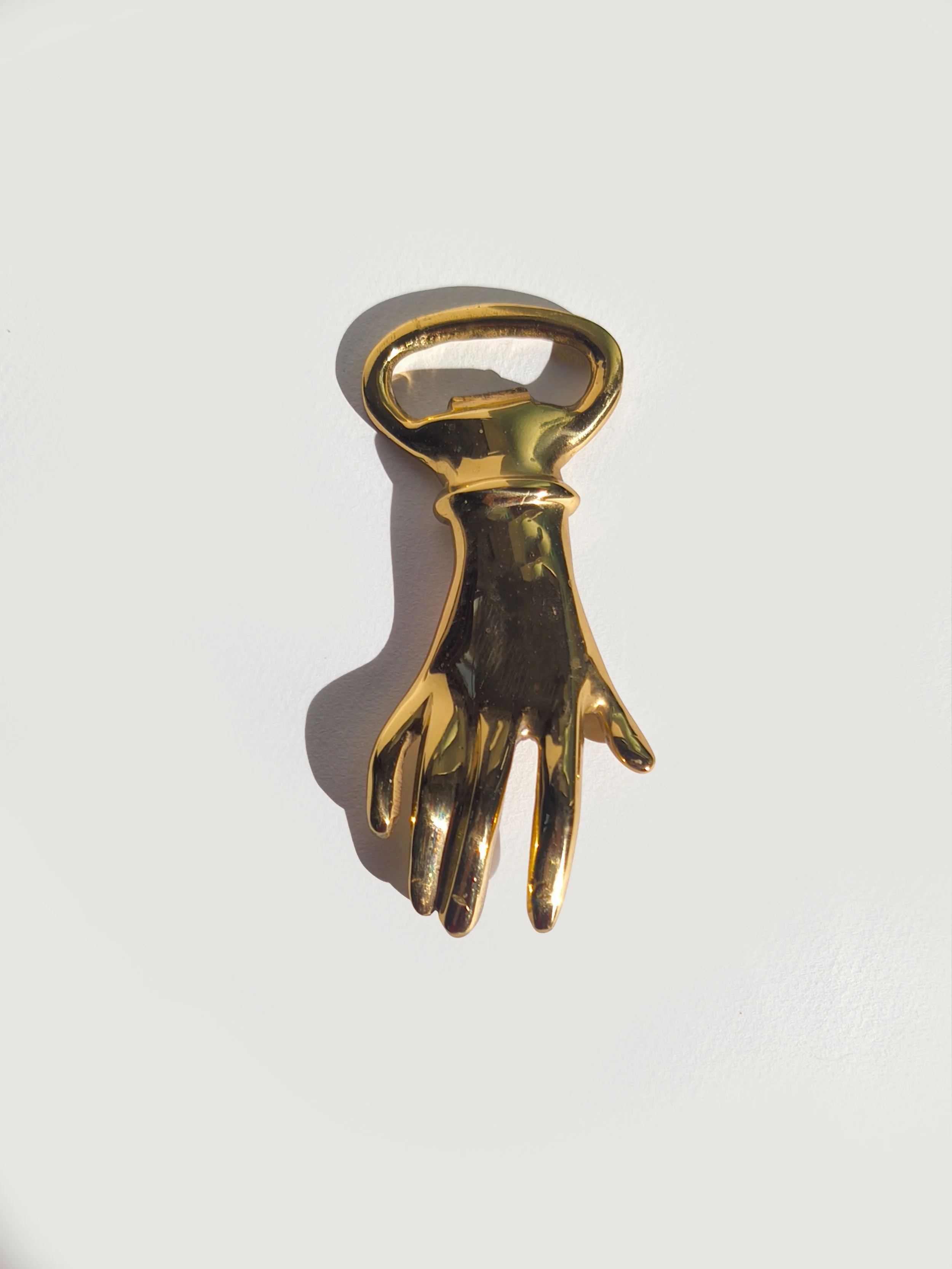 les-objoies-hand-golden-bottle-opener-2.jpg