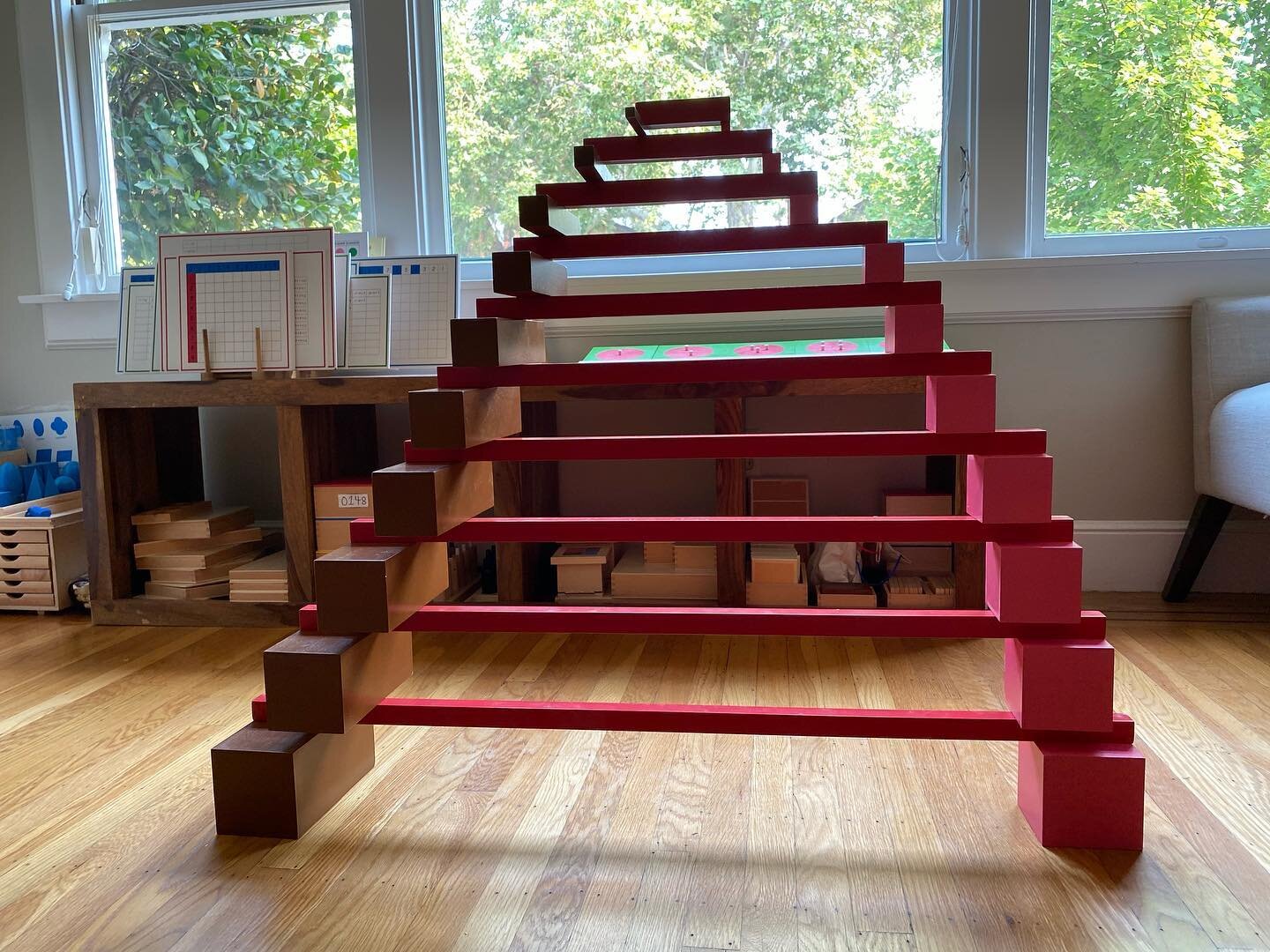 Loving this Pink Tower, Brown Stairs, Red Rods extension. The Montessori sensorial materials are used to help children develop and refine their five senses. I appreciate how these material have a built in control of error, meaning that the children n