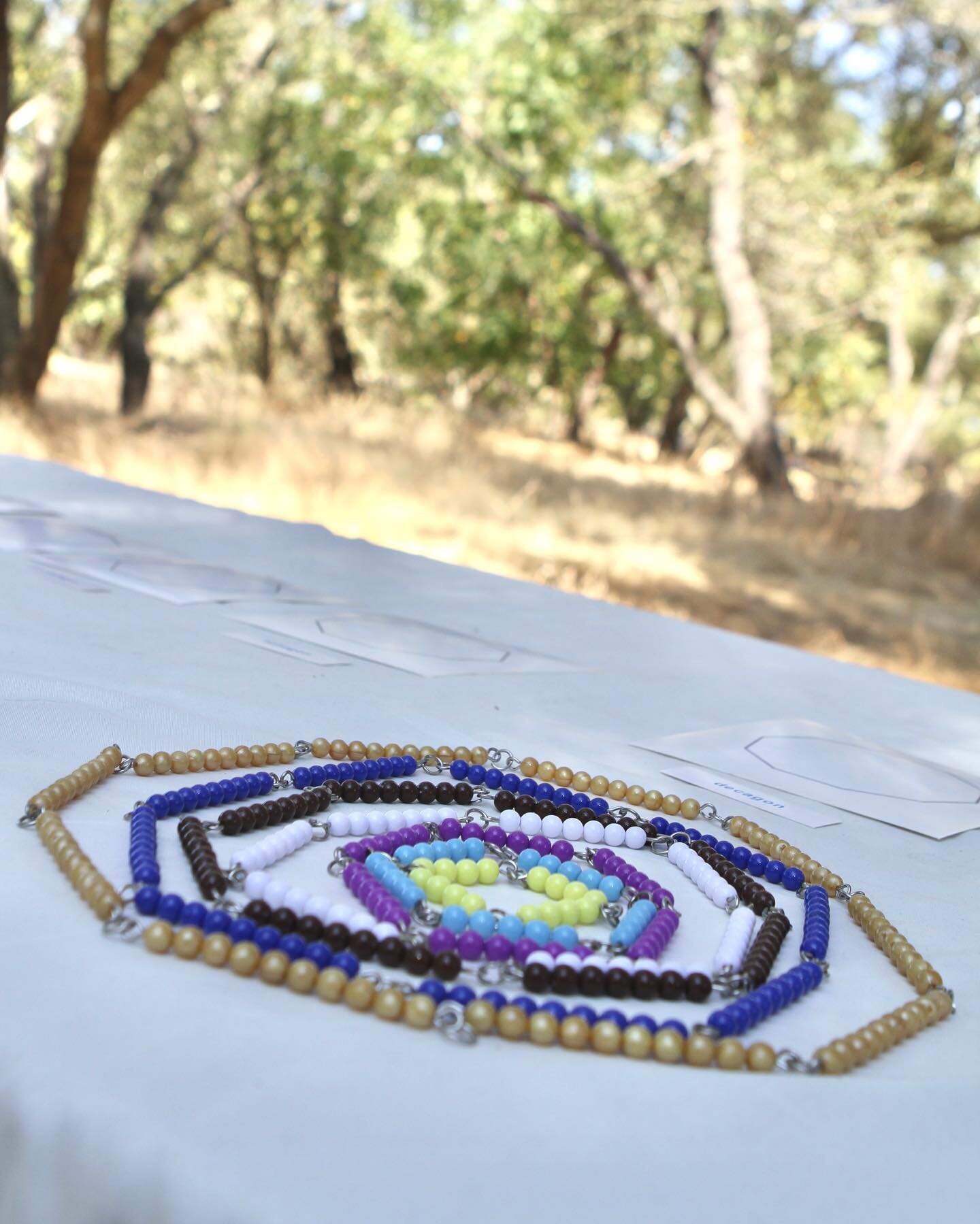 Listening to the sweet sounds of nature while building polygons with the Geometric Cabinet form cards and short bead chains. 
🌾
The short bead chain exposes children to skip counting which is preparation for multiplication. It also indirectly prepar