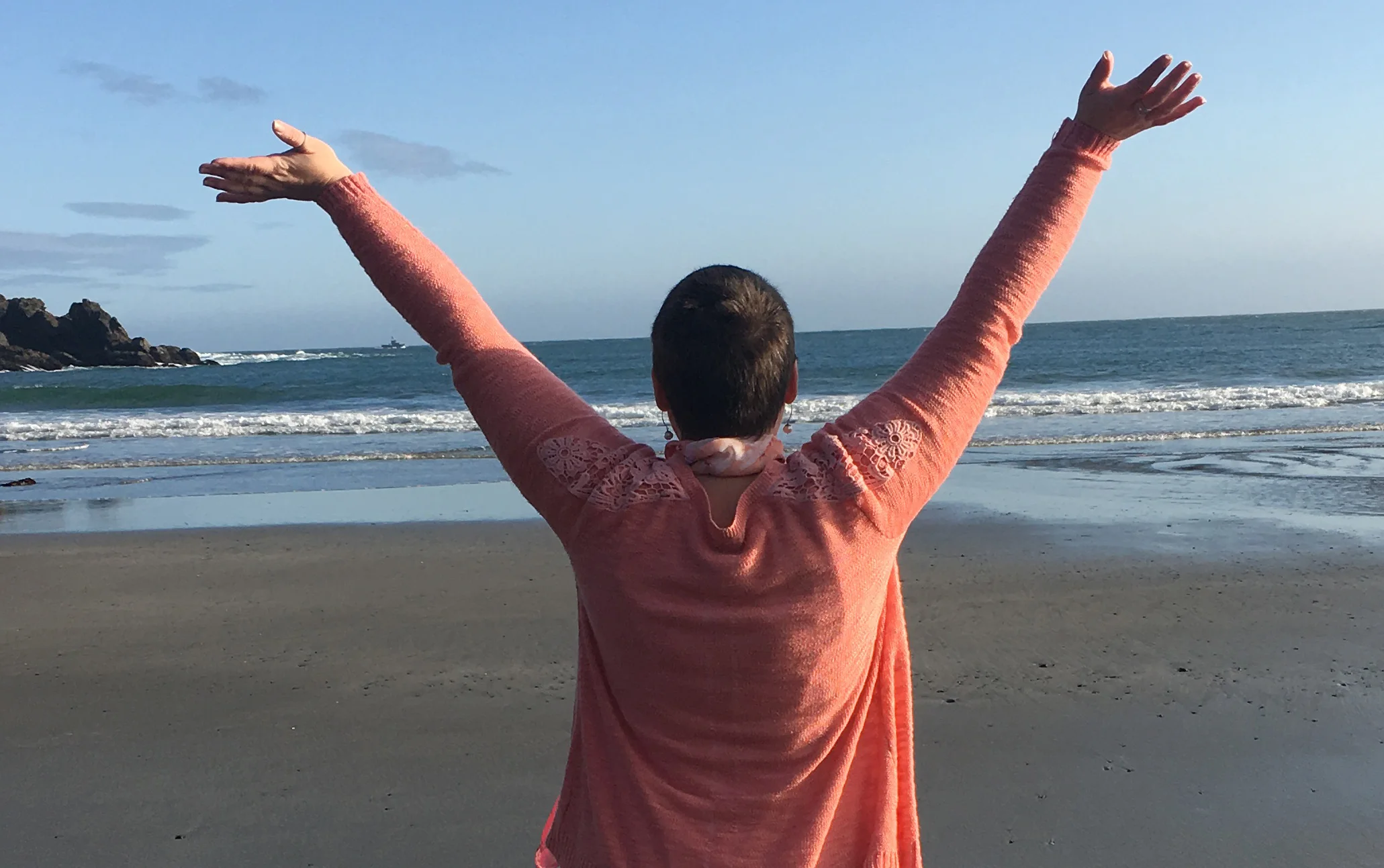 jen-ocean-arms-up-landscape.jpg