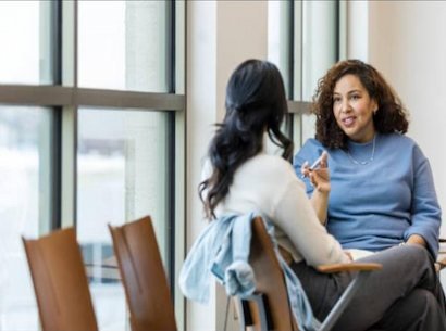 Counsellor sitting with a client during a therapy session