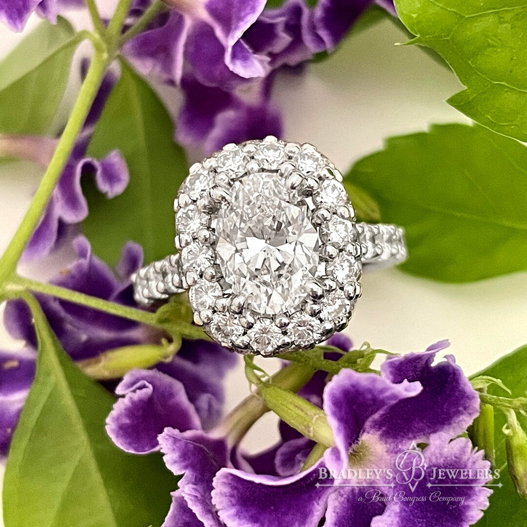 A darling couple came to Bradley&rsquo;s with the goal of showcasing her gorgeous #OvalDiamond in something magnificent for their 8th #Anniversary. This #Custom cushion diamond halo mounting sparkles ✨ from every angle!!! Her reaction at pickup was p