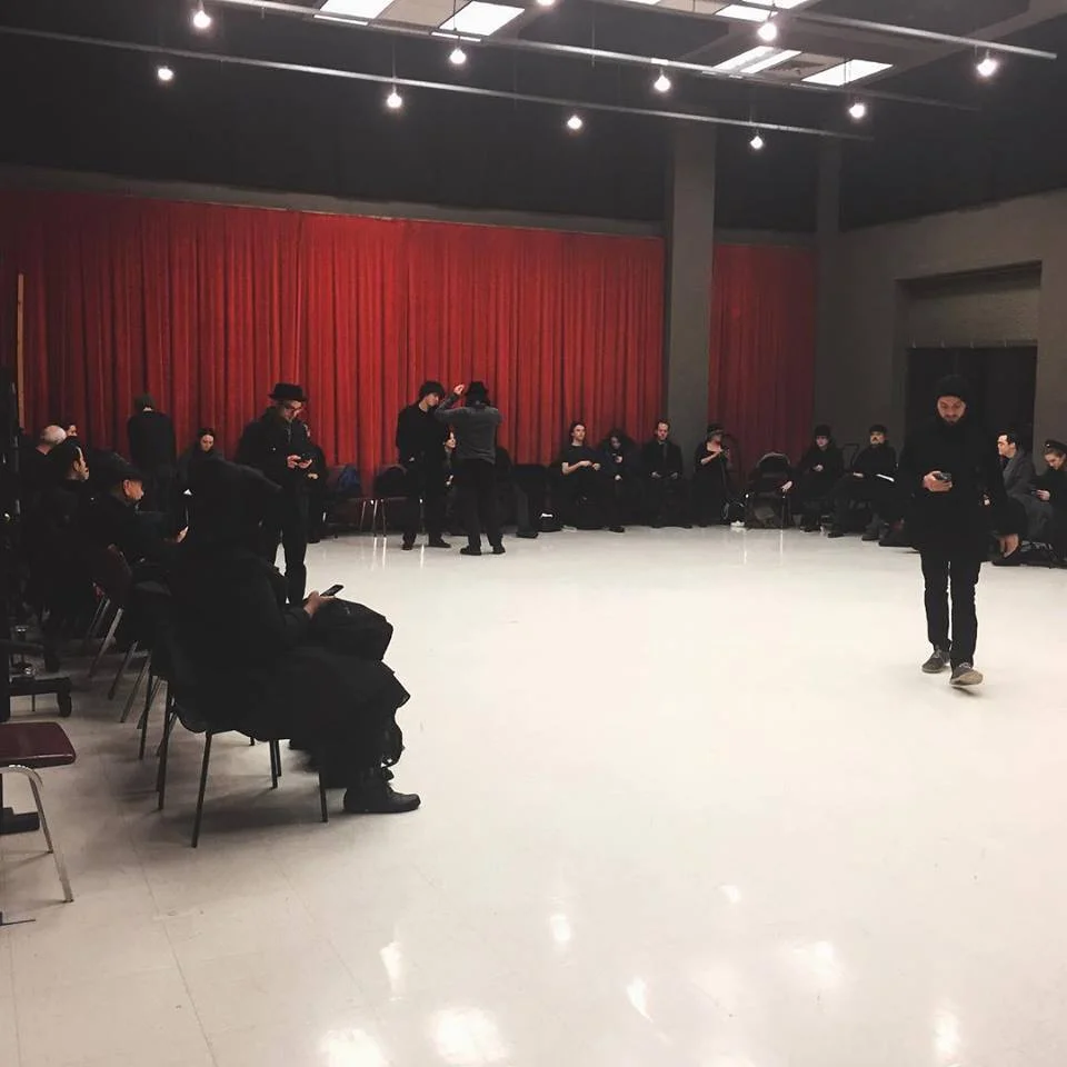 The extras holding room.