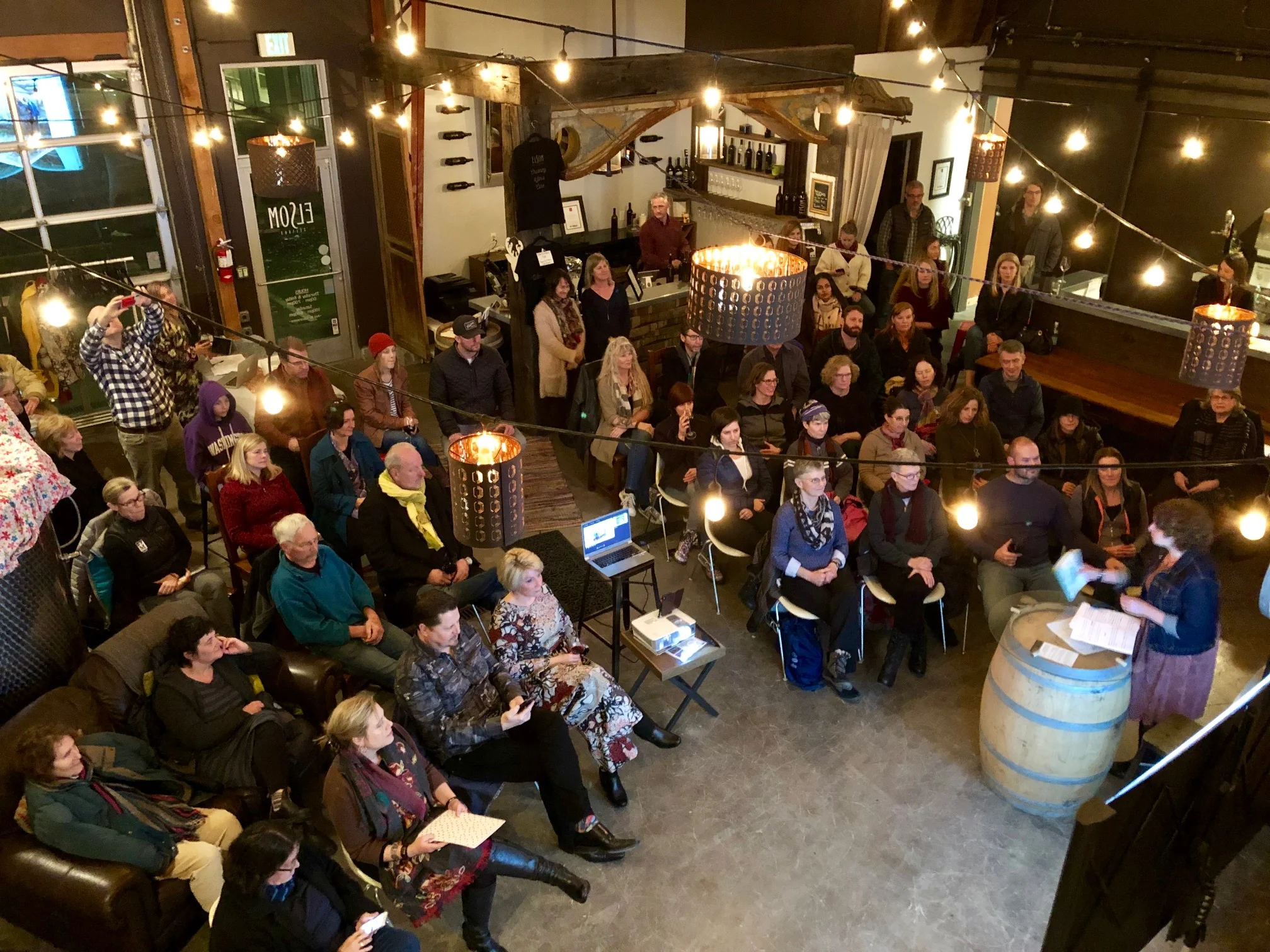 Travelers listening intently to Beth Jusino at Adventure Uncorked at the Adventure Hub & Winery on February 7, 2019. Hosted by Explorer X.
