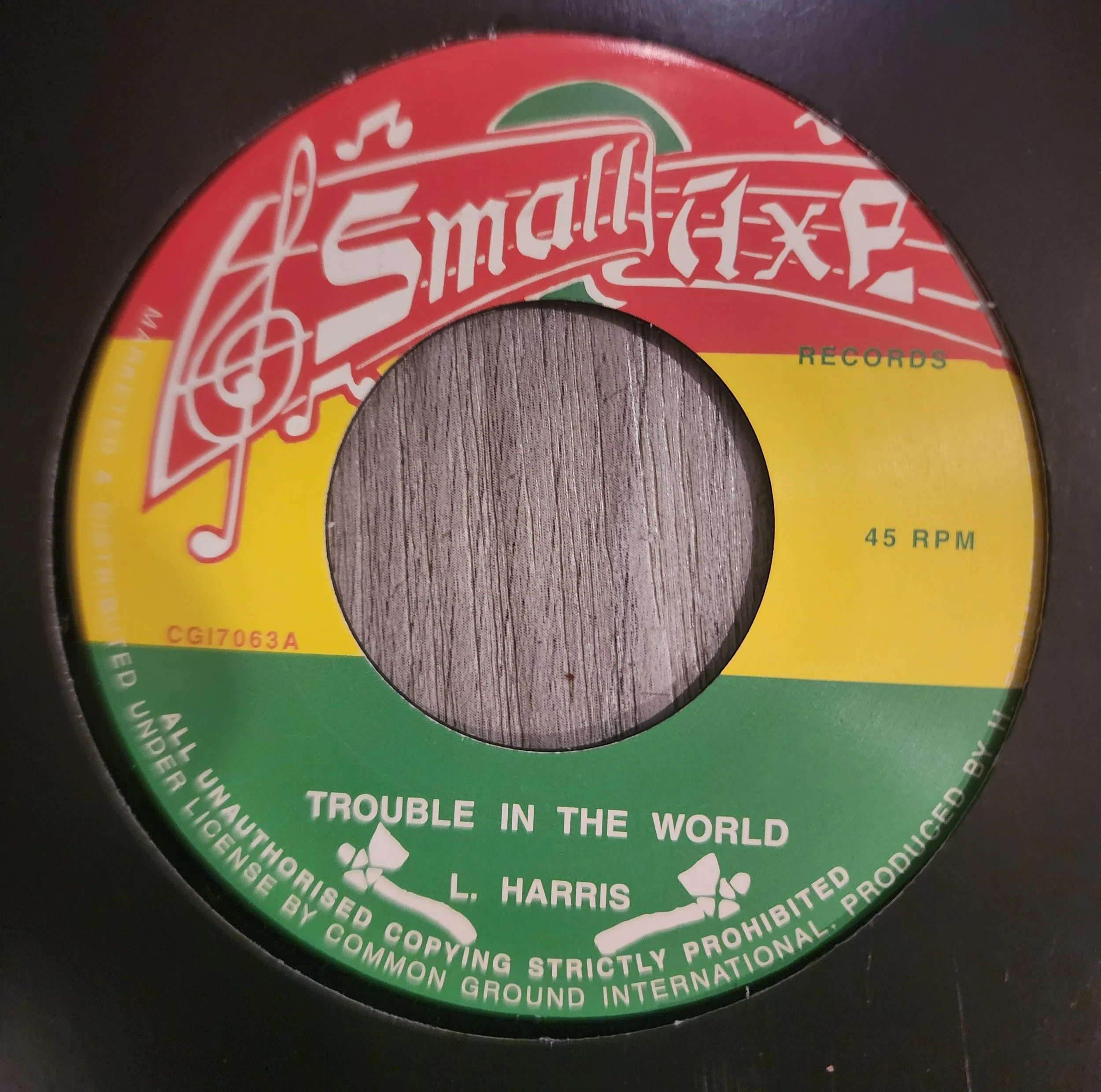 CGI-7063 - L. Harris - Trouble In The World - 7"