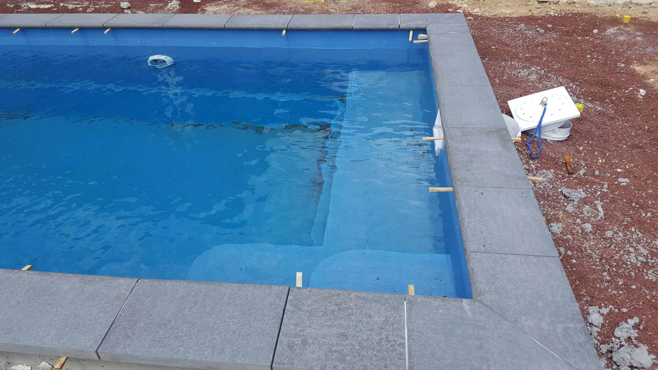 Detail of coping stone installation.&nbsp;