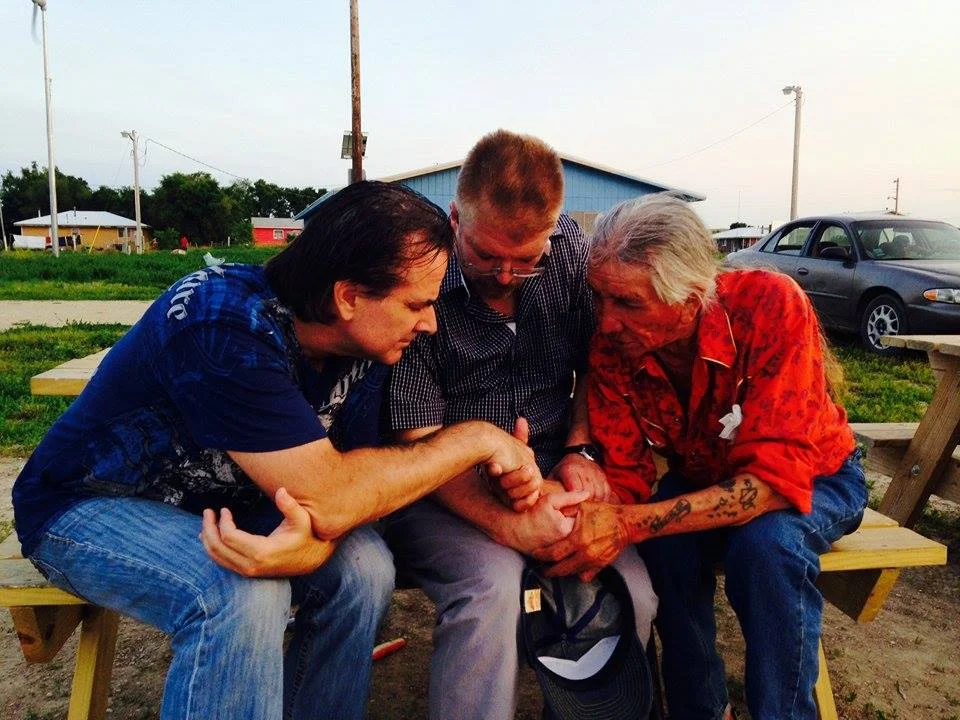 Pastor Jim (center) during his Missions Trip to South Dakota, USA