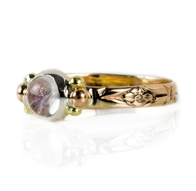J. Noelle3_moonstone_ring_side1.jpg