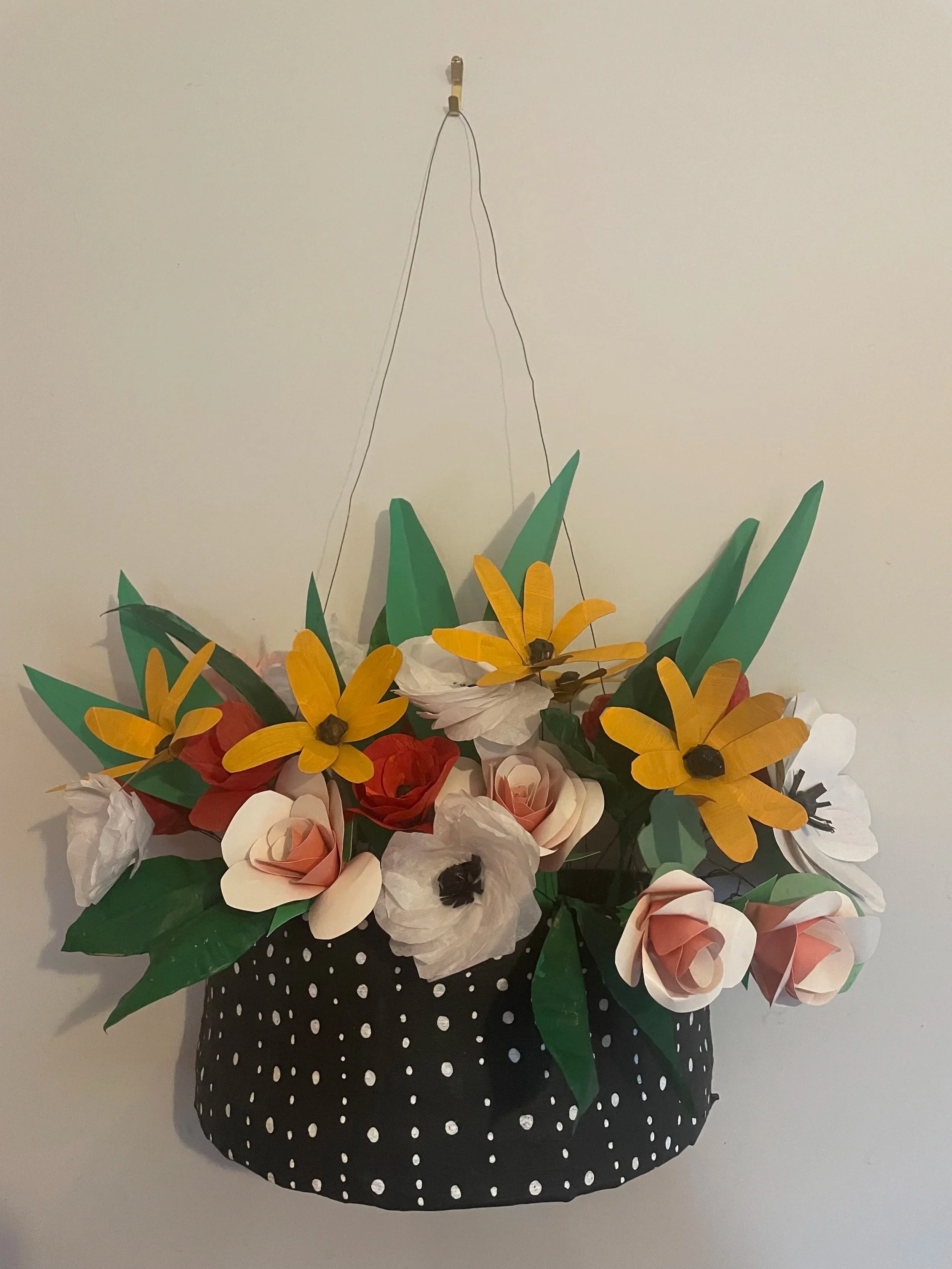  Paper mache planter. Cardboard, masking, tape, paper mache, acrylic paint.    Paper flowers. Tissue paper, glue, gesso, acrylic paint, floral wire. 