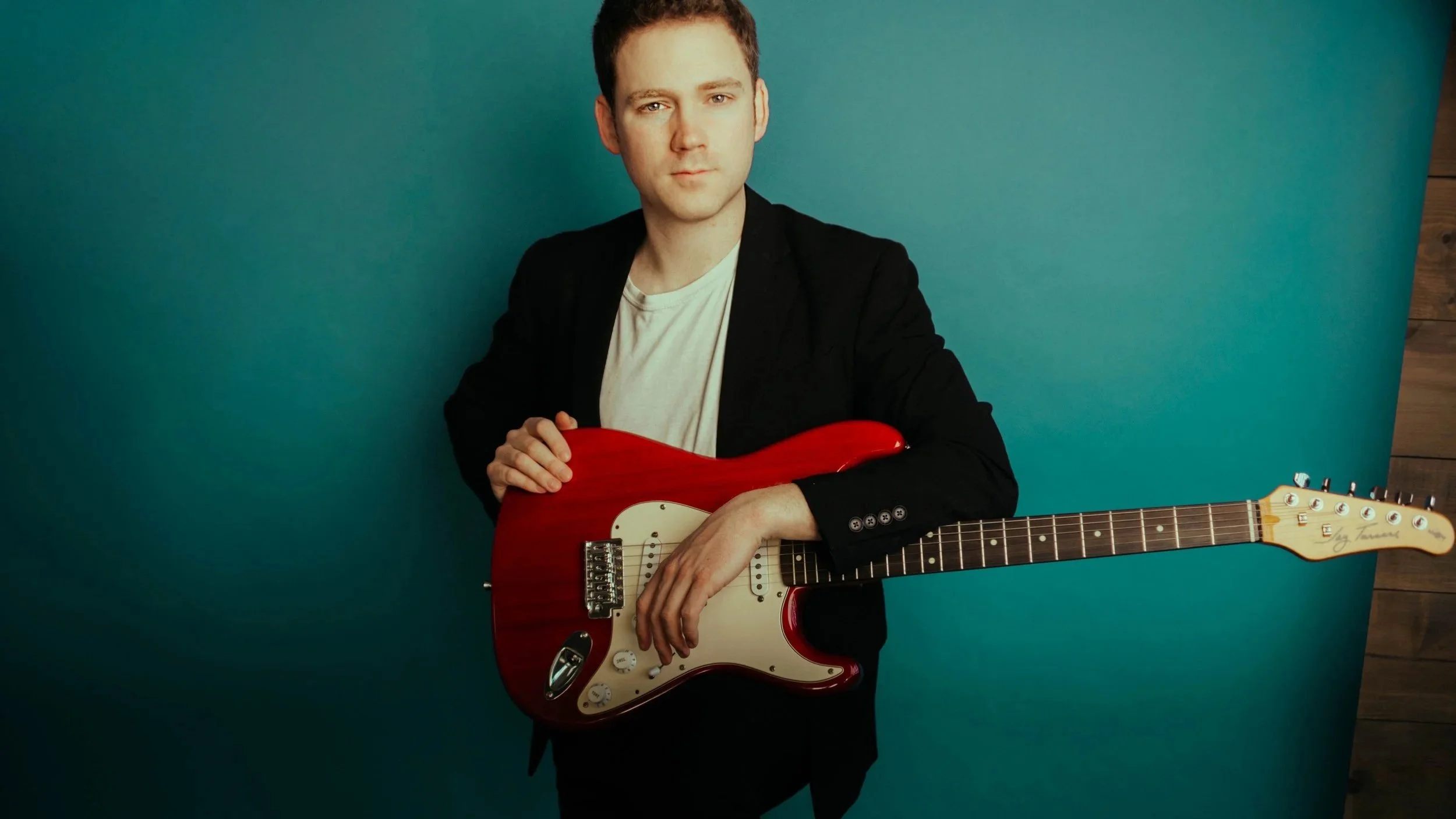 Chris Rorrer - red guitar wide.jpg