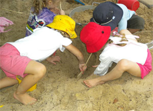 Sand-play-with-hats-small.jpg