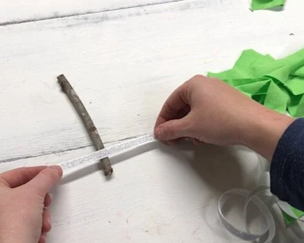 DIY fabric and ribbon Christmas tree ornament. How to make super frugal ornaments for Christmas with your kids. Easy stick tree ornament