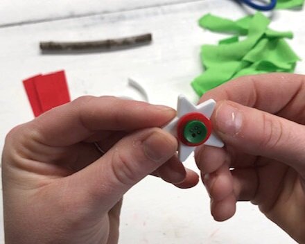 DIY fabric and ribbon Christmas tree ornament. How to make super frugal ornaments for Christmas with your kids. Easy stick tree ornament