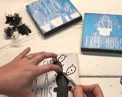 DIY mini wood sign tutorial. How to make hand painted wood signs with stencils, funny cactus signs, Don't be a prick, go sit on a cactus, free hugs cactus decor