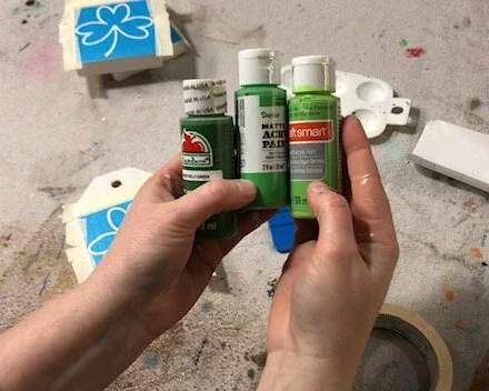 DIY craft kit for adults. How to make mini wood tags for St. Patrick's Day using your Cricut. How to stenicil wood signs for spring.