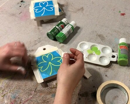 DIY craft kit for adults. How to make mini wood tags for St. Patrick's Day using your Cricut. How to stenicil wood signs for spring.