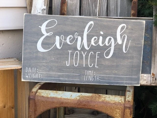 DIY painted baby name and stats sign