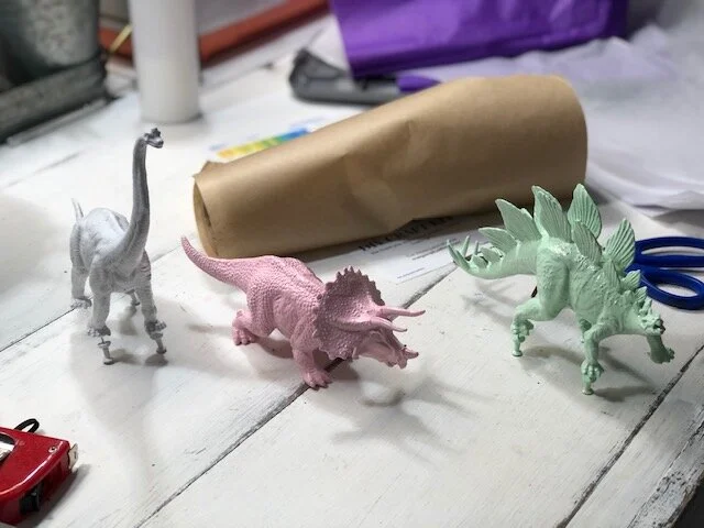 Make your little girl's dinosaur room dreams come true. How to spray paint cheap plastic dinosaurs to make them girly. DIY girl themed dinosaur bedroom for your daughter.