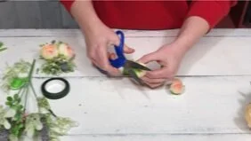 DIY corsage made with faux flowers. How to make a corsage for little girls with fake flowers from Walmart. Silk flower easy corsage for spring, prom, weddings, father daughter dance.