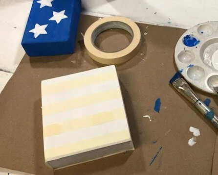 How to make a 2x4 American flag. DIY chunky wooden flag for your primitive rustic home decor. This tutorial will show you how to paint and distress your own wood flag to tie in with your 4th of July, Independence Day, farmhouse style decorations.