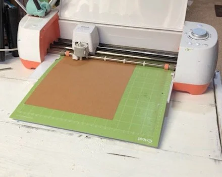 How to use your Cricut to make wood star cutouts. Learn how to make templates with your vinyl cutting machine to cut shapes and letters out of wood.