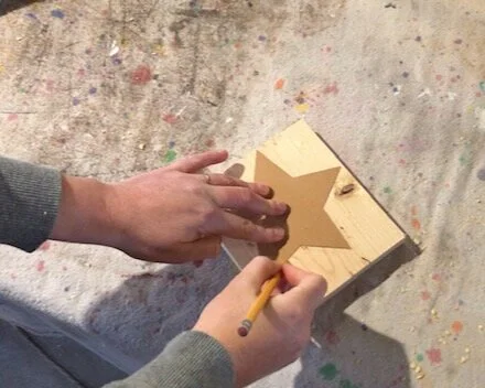 How to use your Cricut to make wood star cutouts. Learn how to make templates with your vinyl cutting machine to cut shapes and letters out of wood.