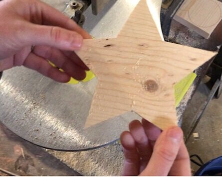 How to use your Cricut to make wood star cutouts. Learn how to make templates with your vinyl cutting machine to cut shapes and letters out of wood.