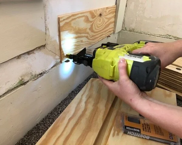 DIY plank wall, how to make your own plank wall on a budget. How we made a faux plank wall for less than $50, shoe string budget bedroom remodel. Plywood panel planked wall for your home.