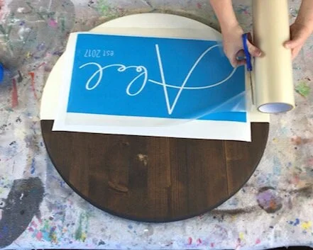 DIY modern farmhouse round last name established sign. How to make a personalized round wood sign. DIY round wood door hanger for last names. Half stained half painted round wooden sign how to tutorial.