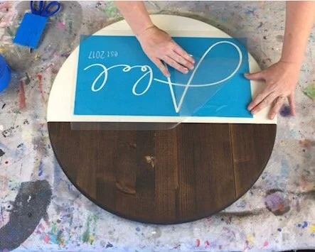 DIY modern farmhouse round last name established sign. How to make a personalized round wood sign. DIY round wood door hanger for last names. Half stained half painted round wooden sign how to tutorial.
